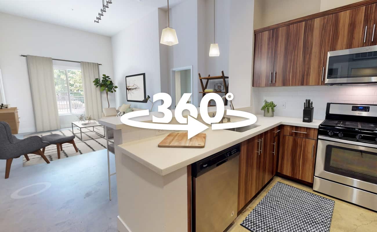 360-degree view of a two-bedroom, two-bathroom apartment showcasing an open layout with natural light and stylish finishes.